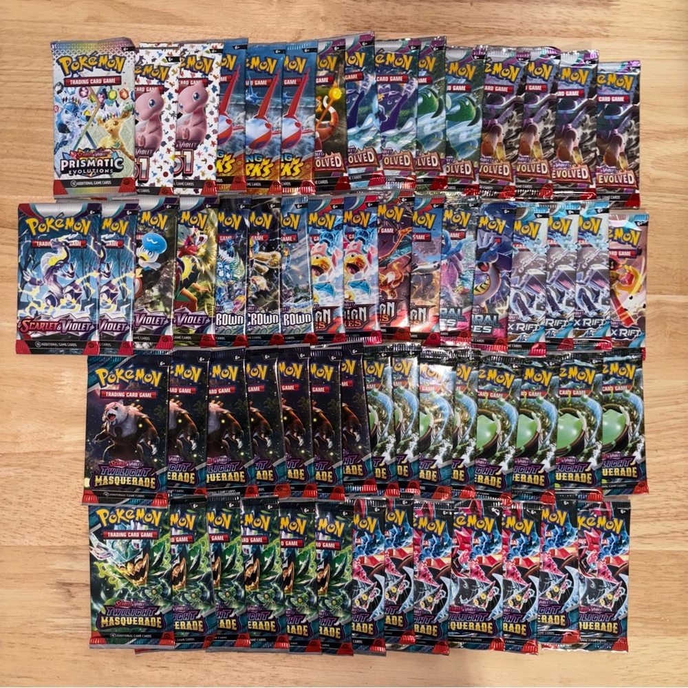 77 Pokemon Loose Booster Packs (Prismatic , 151 , Surging , Twilight , etc)